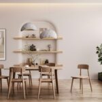 a dining room with a table and chairs