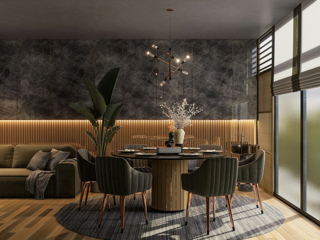 A living room with a couch a table and chairs